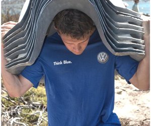 Guy walking on the beach